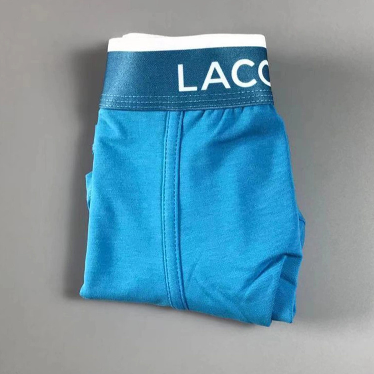 Europa y los Estados Unidos transfronterizos peces de moda para hombres, pantalones de algodón transpirables, pantalones cortos de ángulo plano de moda cómodos y casuales, productos en stock