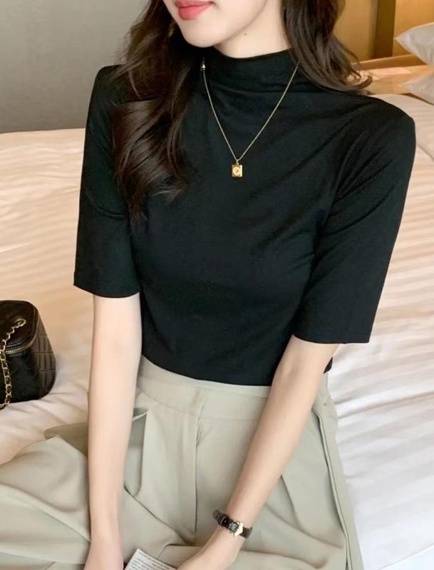 秋冬の小さい立襟の半袖のtシャツの女性の早秋の新型の韓国版は半高襟の5分の袖の純色の上着を身につけます。|undefined