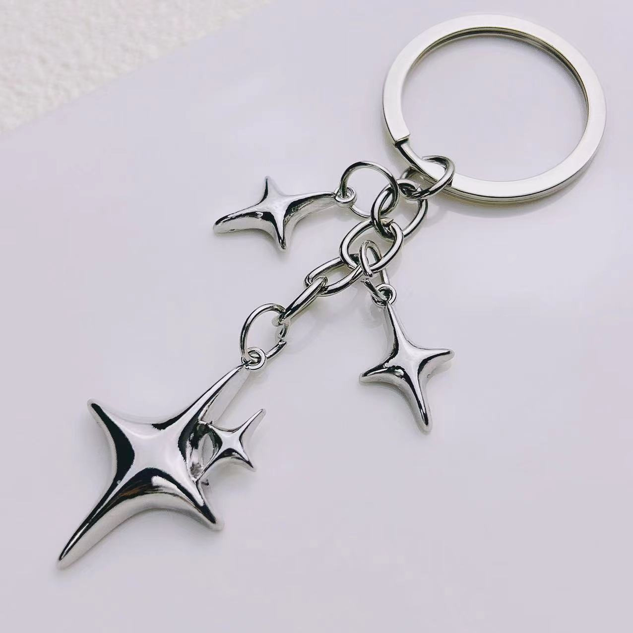 Cross-Border Hot Selling DIY Creative Four-Pointed Star Alloy Star Keychain Pendant Mobile Phone Bag Key Pendant Wholesale