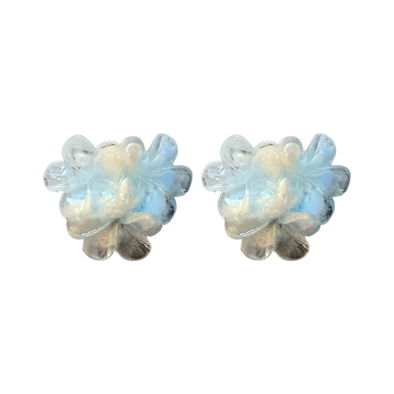Pendientes de flores de súper hadas manchadas con agujas de plata Pendientes de todo fósforo de moda Personalidad femenina Pendientes de temperamento de lujo ligero Sensación de clase alta de nicho