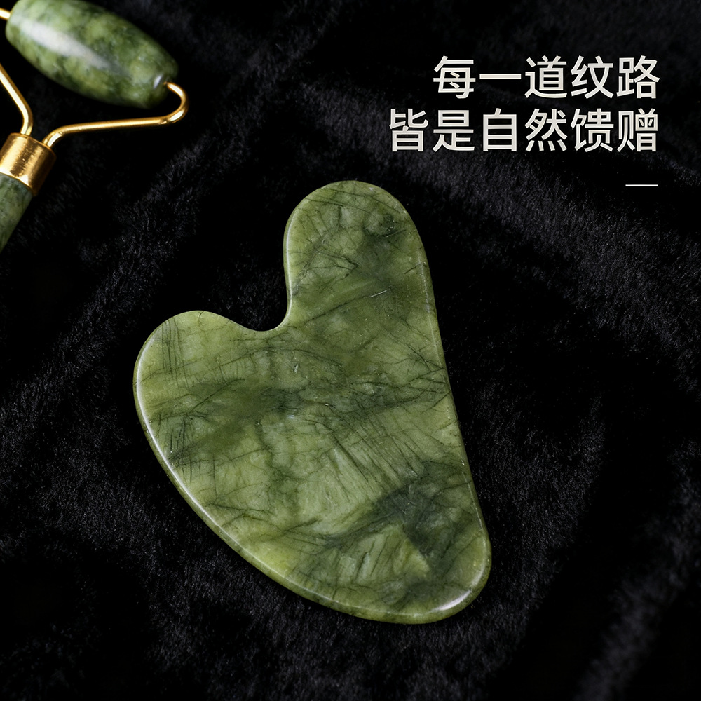 Fábrica de masaje facial en forma de corazón verde phoenix placa de masaje mayorista universal de todo el cuerpo rodillo de masaje de cuello meridiano