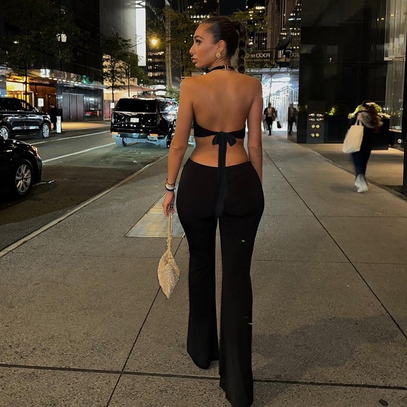 Verano de 2025 nuevo estilo transfronterizo europeo y americano pantalones de estilo estereoscópico flor caliente estilo delgado personalidad de ropa de mujer cuello colgante
