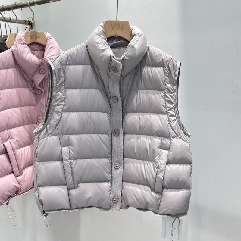 Wholesale women's down vests for autumn and winter, stand-up collar, 2026 new style, layered warm vests and jackets Wholesale women's down vests for autumn and winter, stand-up collar, 2026 new style, layered warm vests and jackets