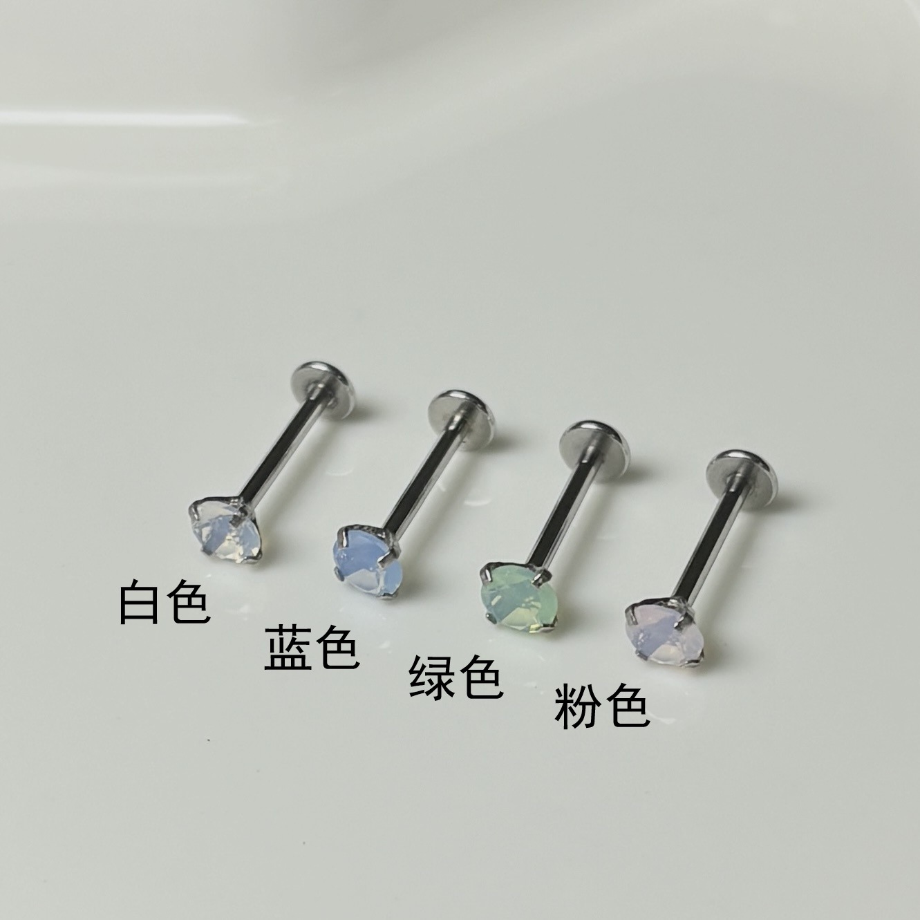 Silver pointed spike labret stud material detail