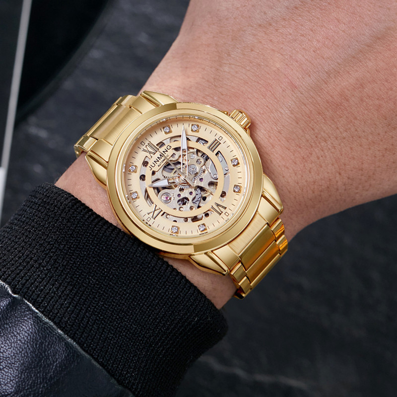 JUNMING marca reloj deportivo impermeable luminoso automático reloj mecánico moda hueco reloj de los hombres