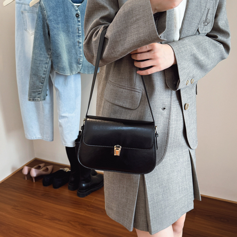 2025 nuevo retro simple bolso de color sólido bolso de hombro de textura de mujer coreana bolso de moda brazo bolso de personalidad