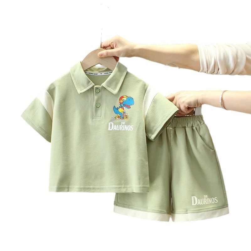 7856 traje de verano para niños 2025 nuevo traje de dos piezas de manga corta de dinosaurio para niños ropa de polo de verano para bebés
