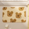 Bear face spreads over rectangle