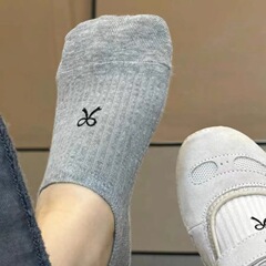 女性の夏の船の靴下の東門の街頭の韓国版の綿の質の通気性の漫画の蝶結びの穴の条は落ちません。