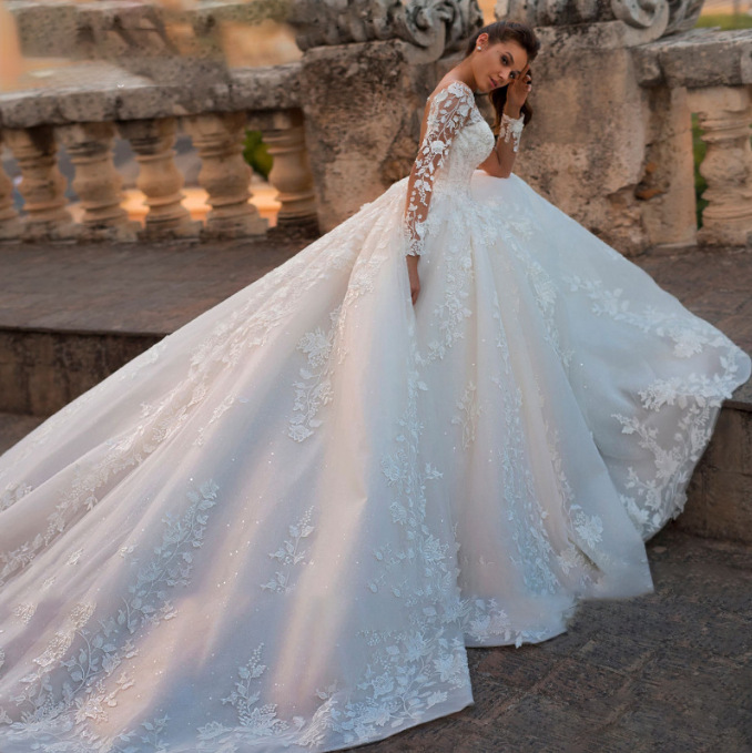 2022 European and American Foreign trade large tail cross-border new wedding dress retro sexy tulle V-neck long sleeve wedding dress 2022 European and American Foreign trade large tail cross-border new wedding dress retro sexy tulle V-neck long sleeve wedding dress