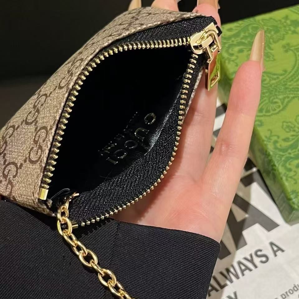 Fabricantes lotes de bolsas de cambio bolsas de lápiz labial bolsas de llaves colgantes bolsas de tarjetas de moda europeas y estadounidenses colgantes abejas GG