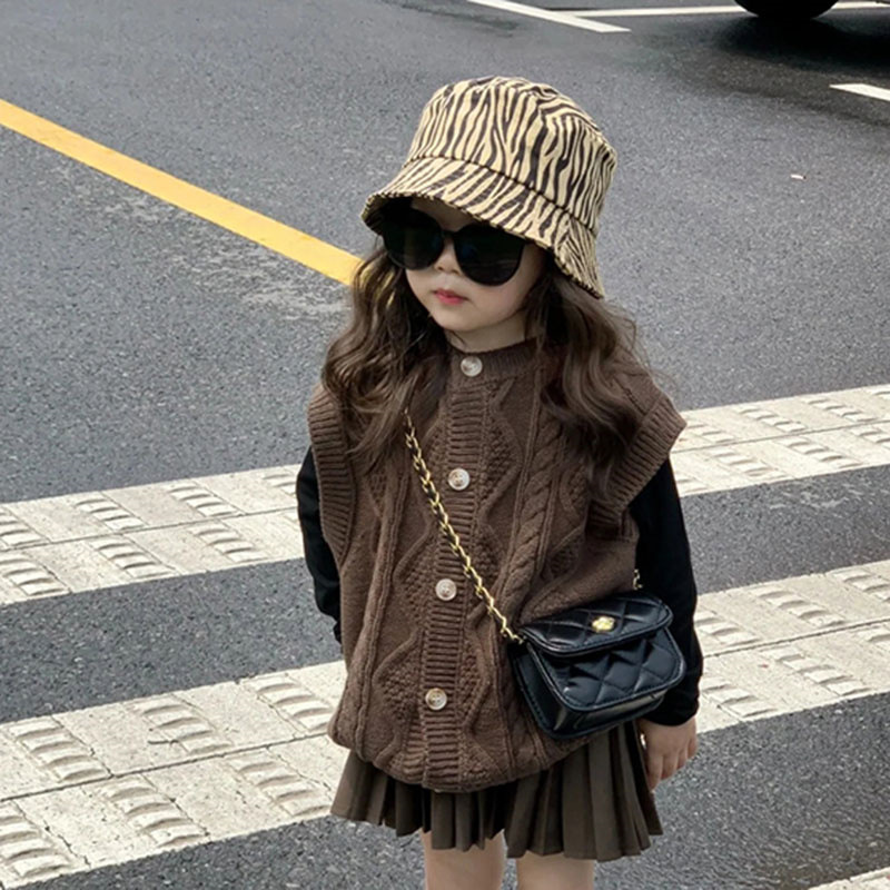 Niñas suéter chaleco 2023 nueva primavera y otoño retro color sólido giro tejido cardigan casual de los niños Falda plisada
