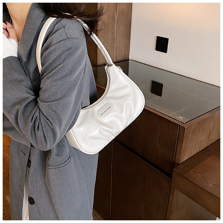 Bolsa de ombro e transversal plissada para mulher versátil_voghion.com