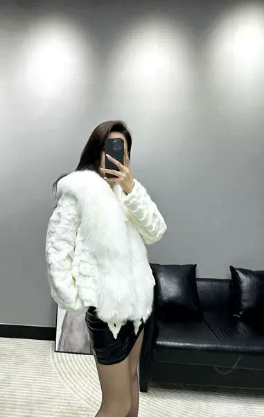 White + with fox fur head