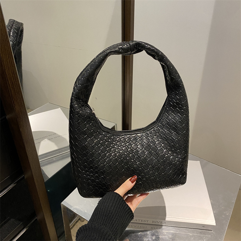 2025 moda popular trenzada simple bolso de viaje de nicho bolso de brazo bolso de hombro de gran capacidad