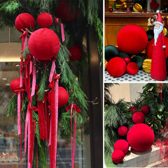 赤いベルベットのクリスマスツリーの蝶ネクタイの祝日の装飾ペンダントのポイント店舗のネットの赤い陳列の造景の配置