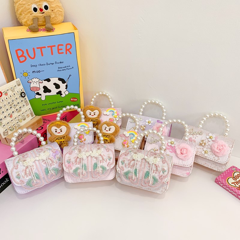 Caricatura lindo mono niña bolso de hombro dulce flor perla bolso de mano nuevo comercio exterior bolso de cadena infantil
