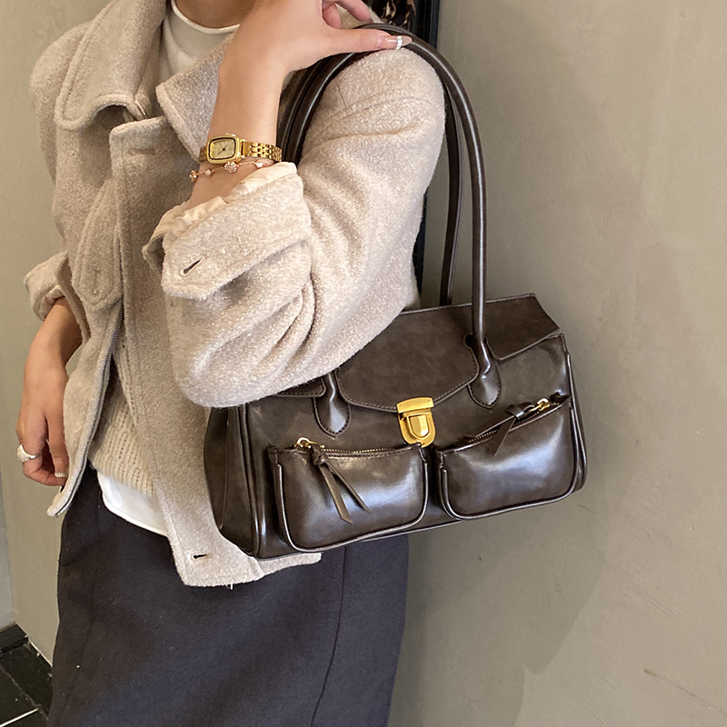 Bolso de mujer de explosión transfronteriza, bolso de tracción retro, bolso de viaje, bolso de hombro, maletín de brazo, bolso de hombro