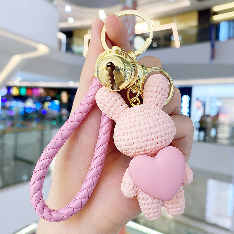 Resina creativa melocotón corazón tejido amor conejo llavero al por mayor ins pareja escuela coche llavero colgante