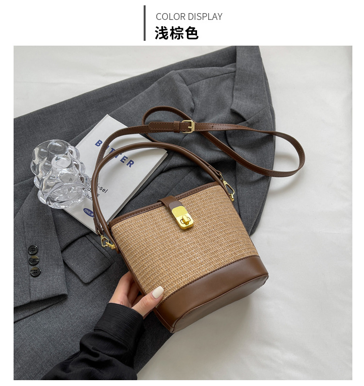 Bolso de nicho coreano bolso de cubo de tejido de mano para mujeres verano 2026 nuevo color de contraste de textura alta bolsa de mochila