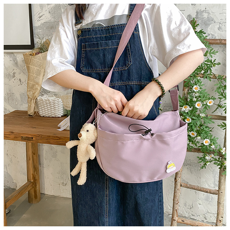 The new 2022 Little Bear canvas small bag for women is simple and versatile. The student dumpling bag is a trendy casual single-shoulder crossbody bag undefined