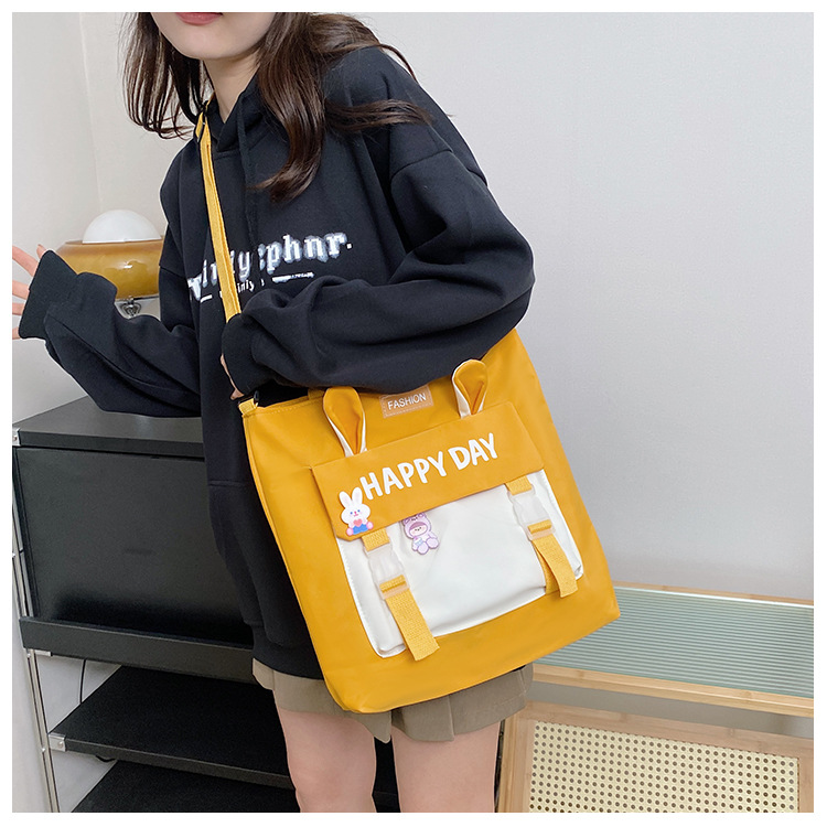 Large-capacity file bag, primary school student handbag that can be carried on one shoulder, book bag for girls with high appearance standards, homework books and test papers bag undefined