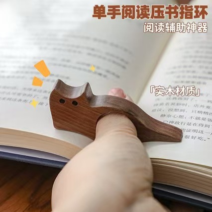 Fuente transfronteriza mascota gato pulgar página prensa de libro anillo de lectura de una mano perezosa lectura apoyar artefacto de lectura
