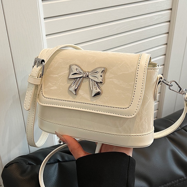 外貿時尚女包2024新款簡約水桶包百搭蝴蝶小方包高級感小眾斜挎包