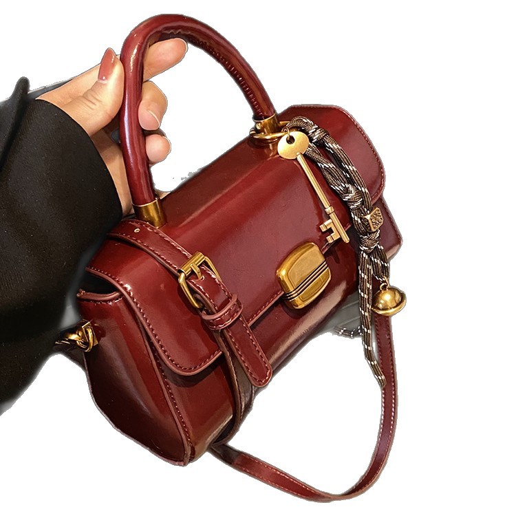 Coreana alta sensación retro bolso mujer 2026 nuevo lujo ligero versátil bolso de mochila de moda bolso de mano