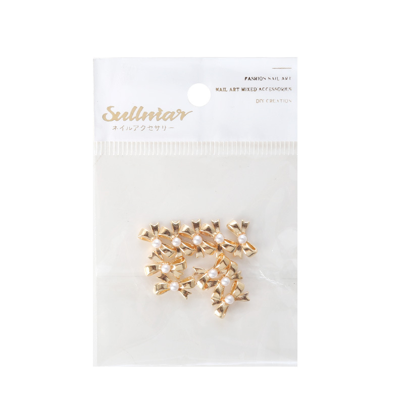 10 unids nail Bow metal joyería cinta francesa perla oro plata pajarita accesorios de uñas mezclado