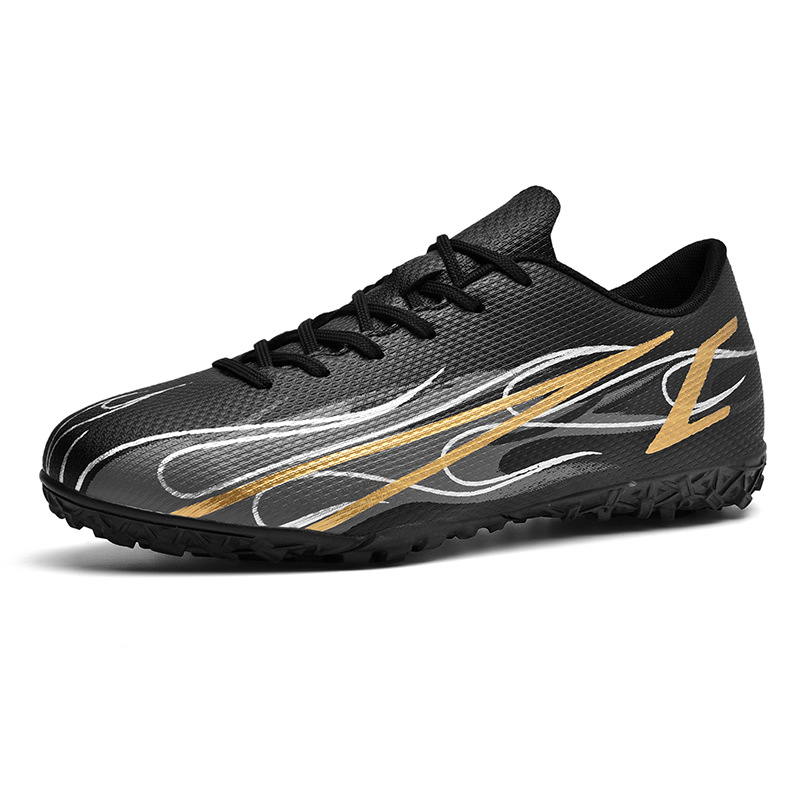 Zapatos de fútbol transfronterizos para niños juveniles juegos de entrenamiento físico entrenamiento de niños pequeños zapatos deportivos al por mayor