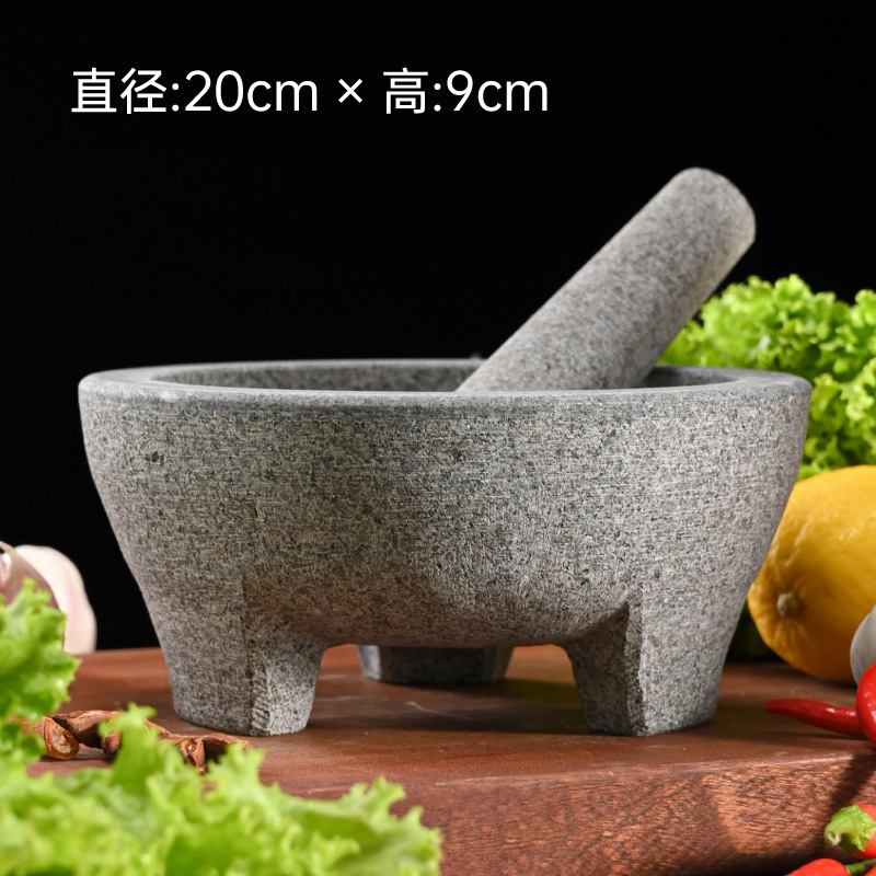 un cilindro de piedra negra tipo molino de piedra de grasa