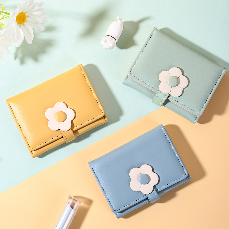 Nuevo estilo coreano de moda simple corto tres plegado billetera de mujer ins tendencia multi-tarjeta adorable pequeña flor pu cartera