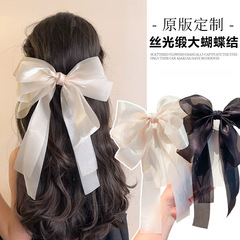 大きい蝶結びの髪飾りのヘアピンの女性2025新型の高級感のスプリングクリップの後頭部の髪のクリップの髪飾りのカード