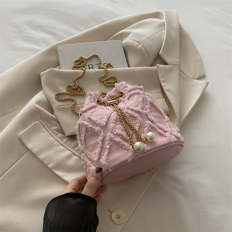 Nicho de diseño bolso de cubo otoño 2024 nuevo bolso de cordón de dibujo bolso de mujer mochila de moda simple bolso de hombro