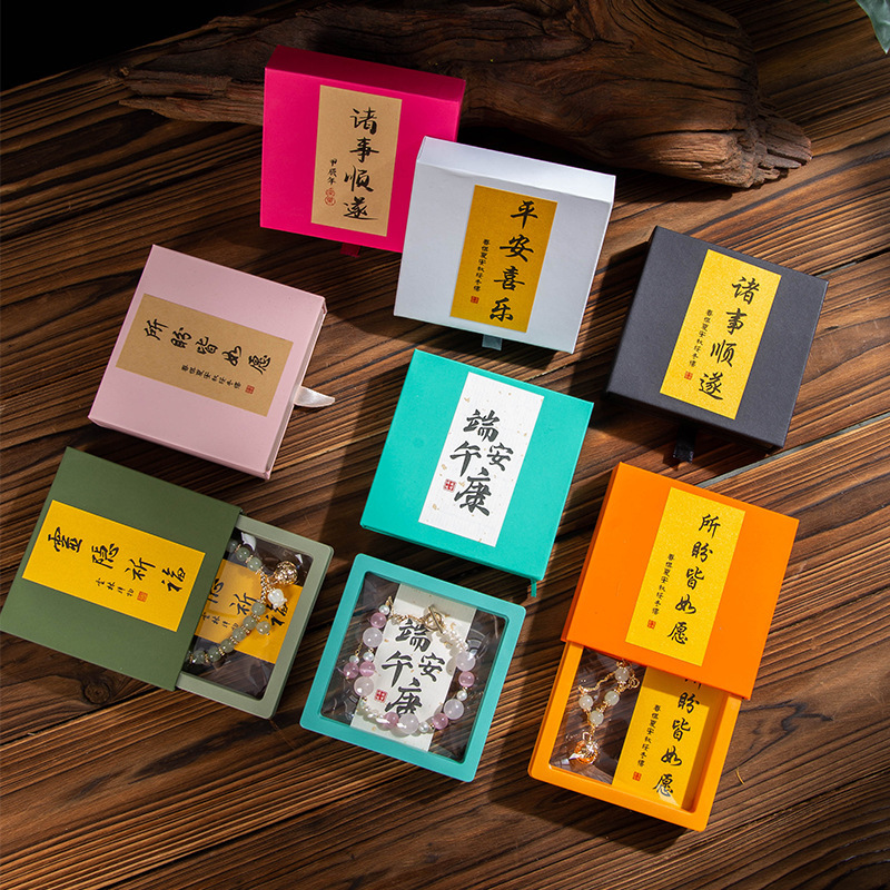 Caja de cajón de papel exterior multicolor extraída Caja de suspensión de almacenamiento Anillo de embalaje de red Caja de joyería de cristal antioxidante