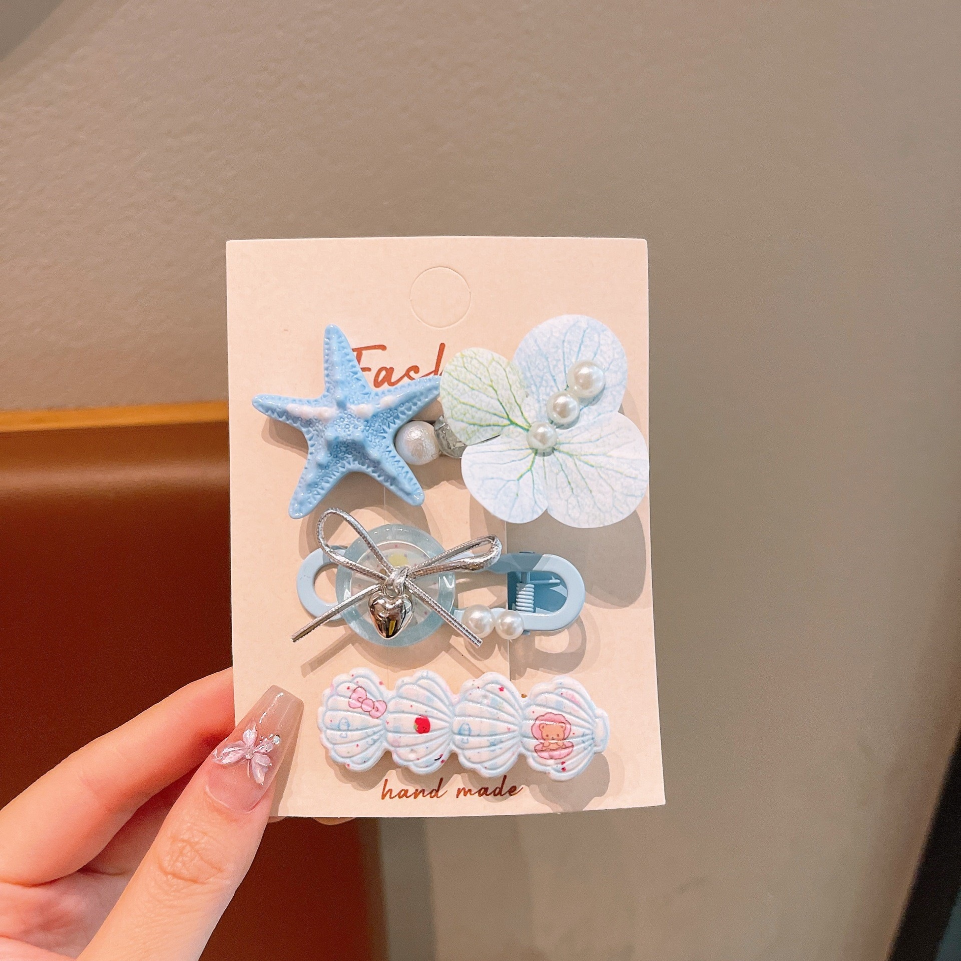 Bonitos pequeños niños frescos clip de pelo conjunto marino viento conchas estrellas perlas tarjetas de pelo princesa niñas al por mayor