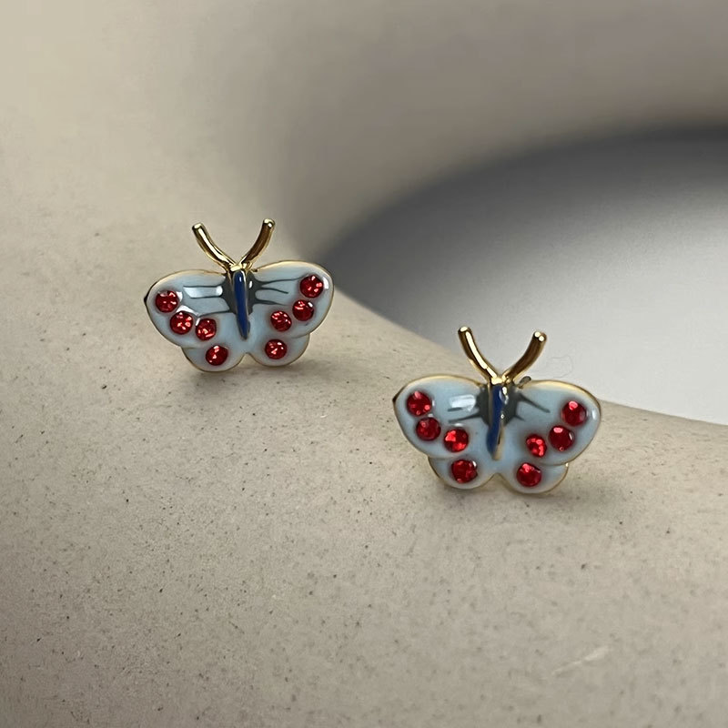 Painted retro enamel with butterfly