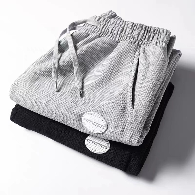 Wholesale waffle pants for men, spring and summer thin loose casual jogger pants, trendy gray sweatpants