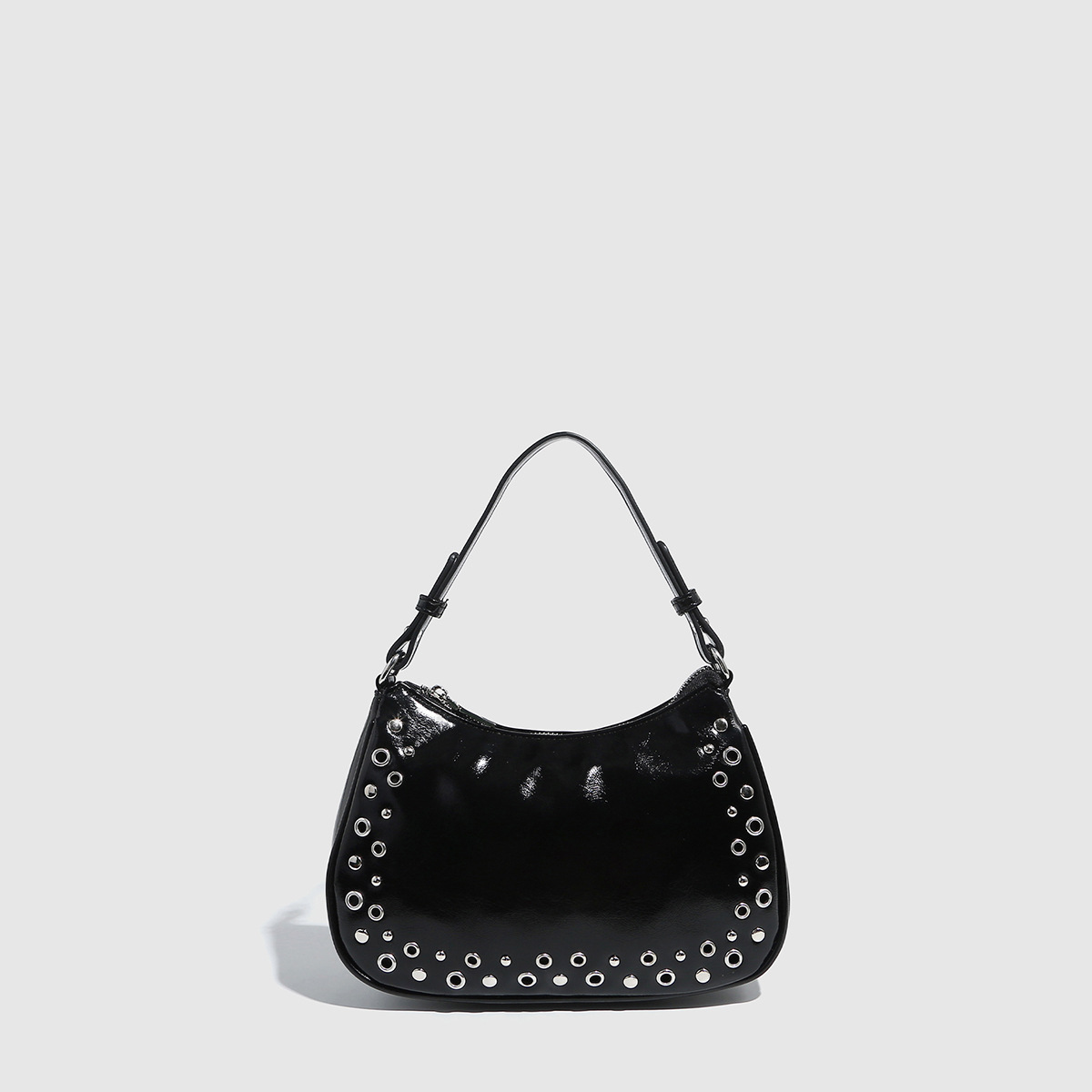 Transfronterizo 2025 nuevo remache hueco ajustable bolso punk bolso de muñeca con cremallera bolso de mujer al por mayor