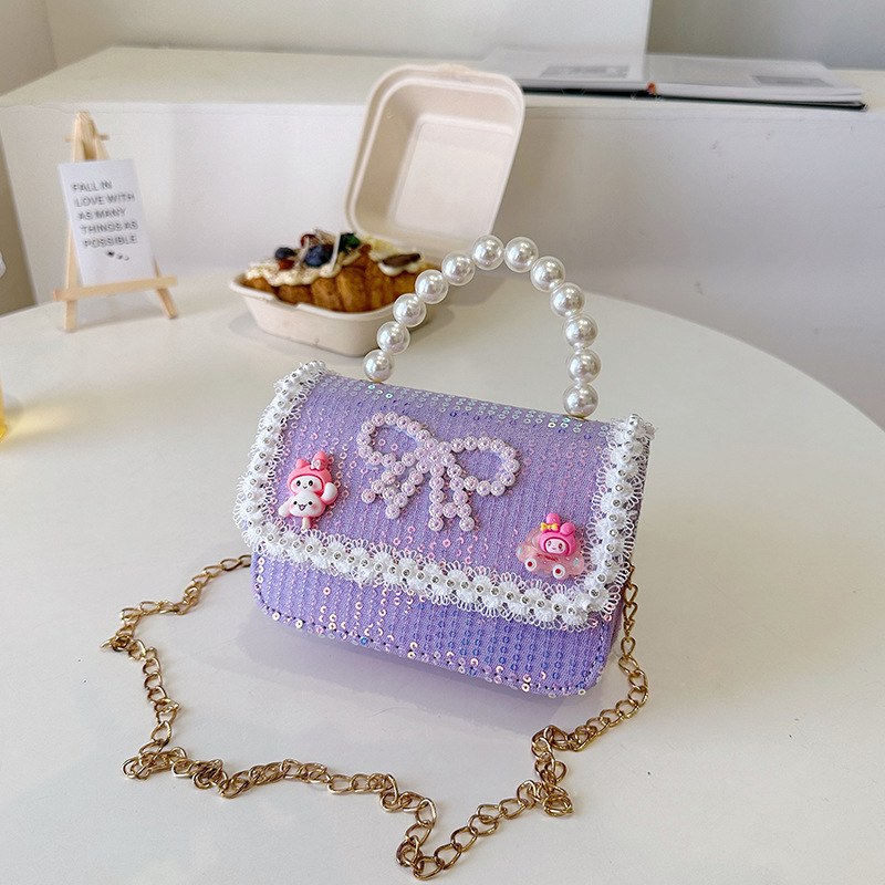 2025 nuevo lindo arco princesa bolsa de perlas portátil moda versátil mochila de hombro bolso de cambio coreano