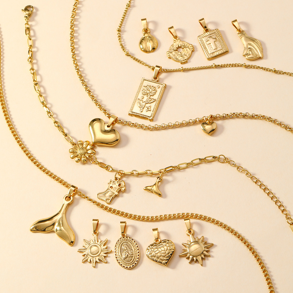 Colgante único Joyas de fundición de acero inoxidable transfronterizas Collar de amor de la cruz del sol Pulsera Colgante de acero de titanio de bricolaje