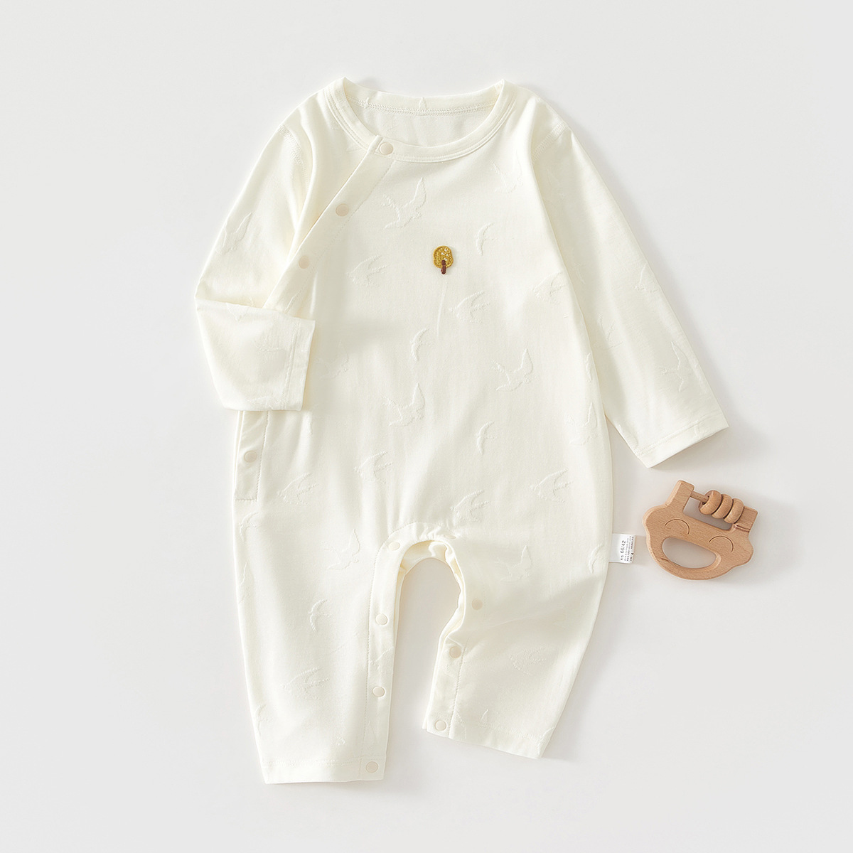 Primavera y verano nuevos productos de algodón Moti flor un estándar de manga larga baby pijama de colga inclinada baby overcoat