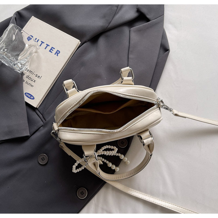 A fashionable Korean-style small square bag for women in the summer of 2025, featuring a simple and retro single-shoulder, crossbody and hand-held pillow bag undefined