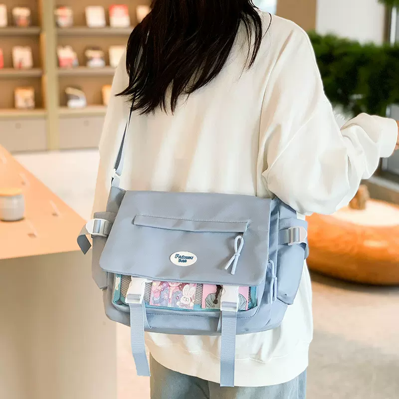 可爱学院风少女斜挎包日系ins学生大容量百搭邮差包透明吧唧痛包