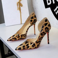 9265-1 European and American style sexy leopard print super high heels nightclub women's shoes pointed shallow mouth side hollowed out thin heel red sole single shoe