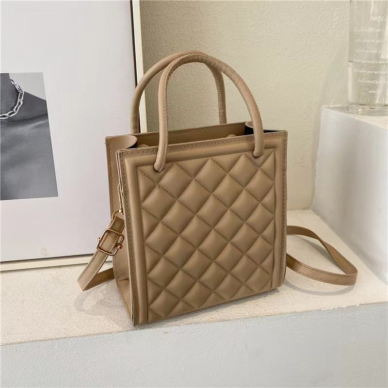 2025 primavera y verano estilo caliente moda casual niños dulces bolsa de gelatina mini bolso de mensajero de un solo hombro variedad al por mayor