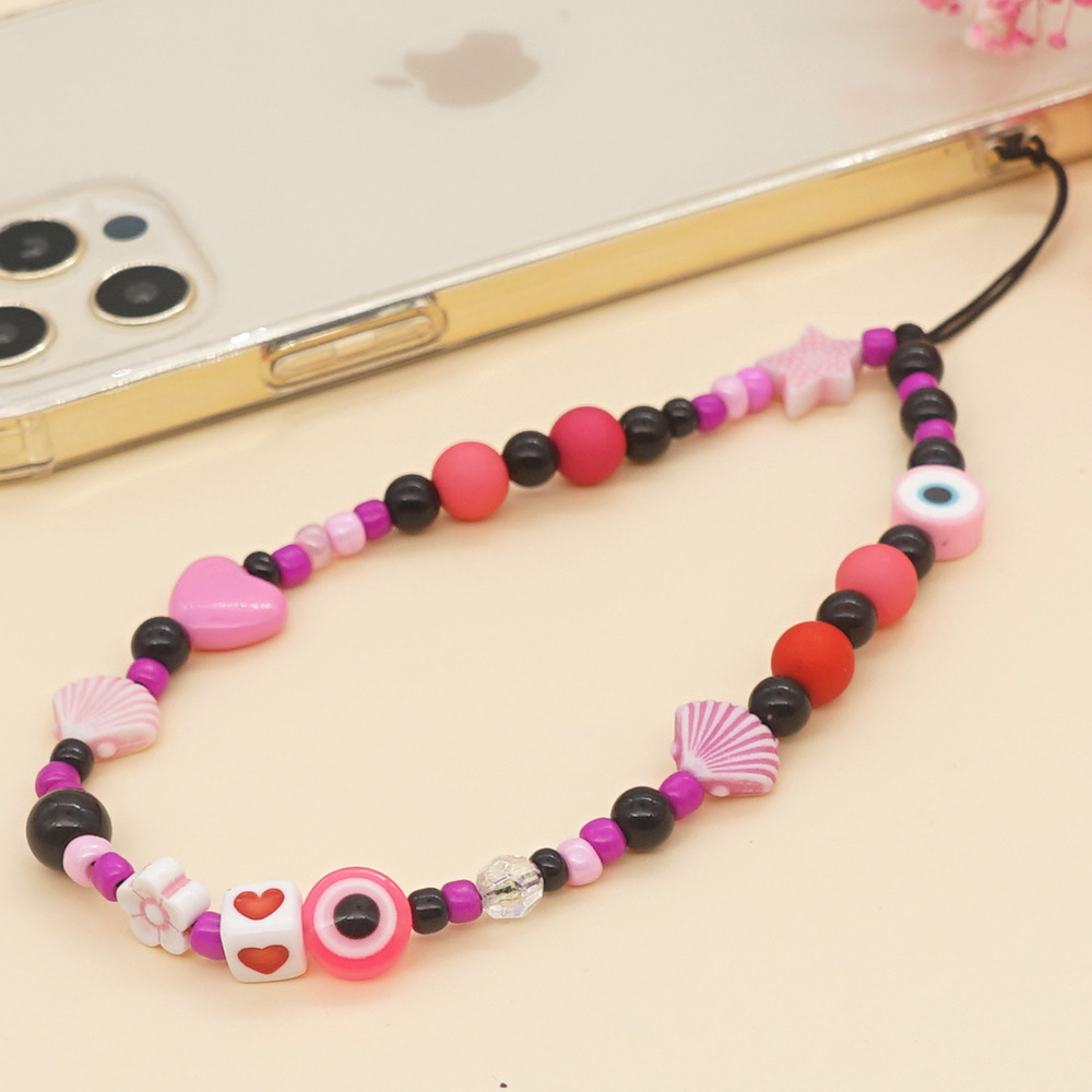 Wholesale Accessories Acrylic Black Round Eye Shell Shape Beaded Mobile Phone Chain Nihaojewelry display picture 2