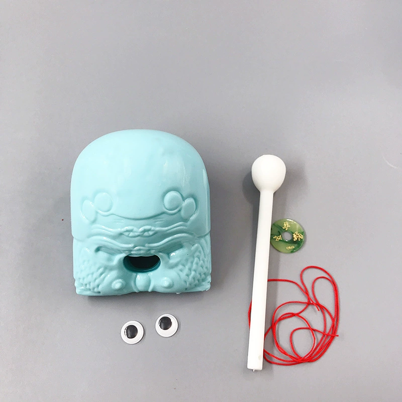 Woodfish percussion toy, plastic, 2" or 3" (6×5×5 cm / 10×8×8 cm), with striker and strap