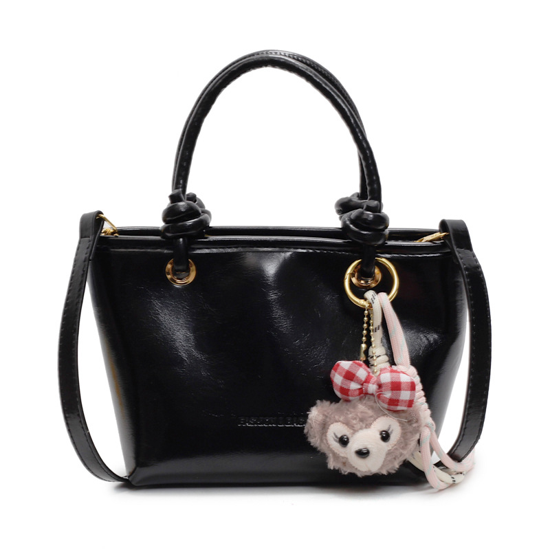 Este año popular bolso de cubo de mano caliente 2025 nuevo bolso de mujer bolso de hombro casual versátil bolso de alta calidad